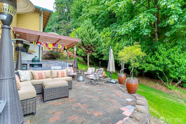 7509 145th St NW, Gig Harbor, WA 98329 - view of patio / terrace featuring outdoor lounge area, a pergola, and an outdoor kitchen