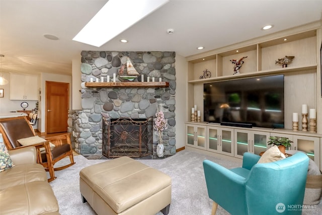 7509 145th St NW, Gig Harbor, WA 98329 - carpeted living room with a fireplace