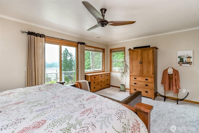 7509 145th St NW, Gig Harbor, WA 98329 - bedroom featuring light colored carpet, baseboards, crown molding, and ceiling fan