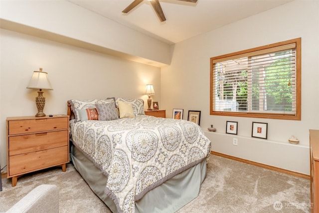 7509 145th St NW, Gig Harbor, WA 98329 - bedroom featuring light carpet, ceiling fan, and baseboards