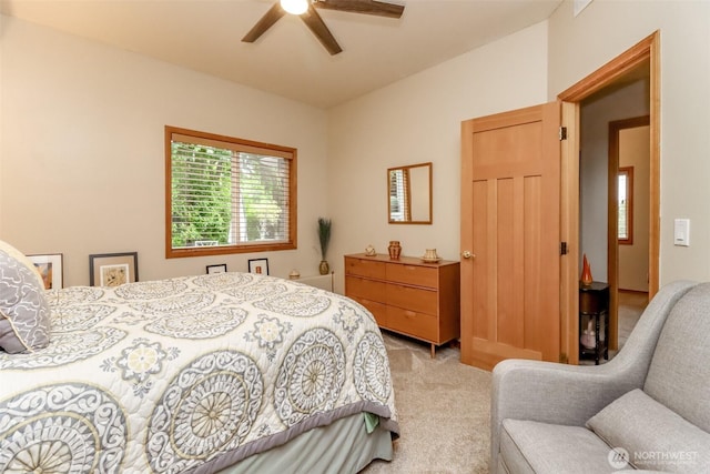 7509 145th St NW, Gig Harbor, WA 98329 - bedroom featuring light colored carpet and a ceiling fan