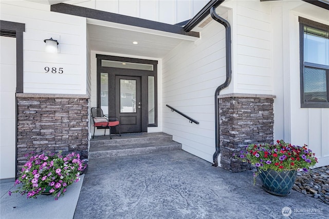 985 Spring Mountain Dr, Wenatchee, WA 98801 - entrance to property with board and batten siding, stone siding, and a porch