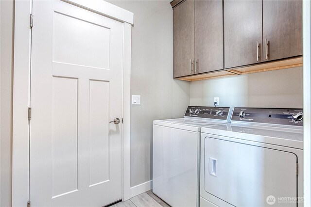 985 Spring Mountain Dr, Wenatchee, WA 98801 - laundry room featuring cabinet space and independent washer and dryer