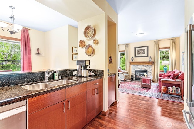 4631 Quinn Ct Unit 101, Bellingham, WA 98226 - kitchen with dishwasher, a sink, healthy amount of natural light, and dark wood-type flooring