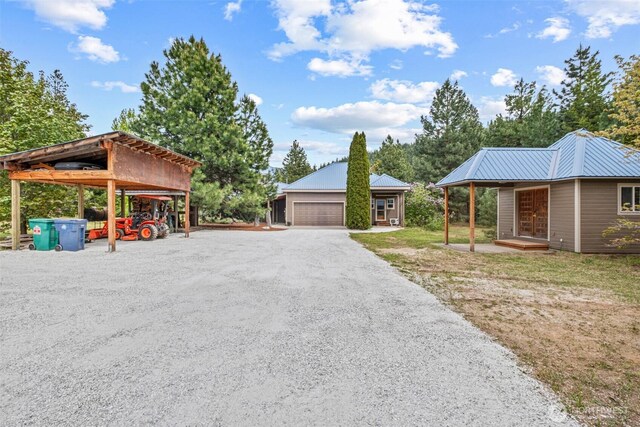 12111 W Shugart Flats Rd, Leavenworth, WA 98826 - exterior space with a garage