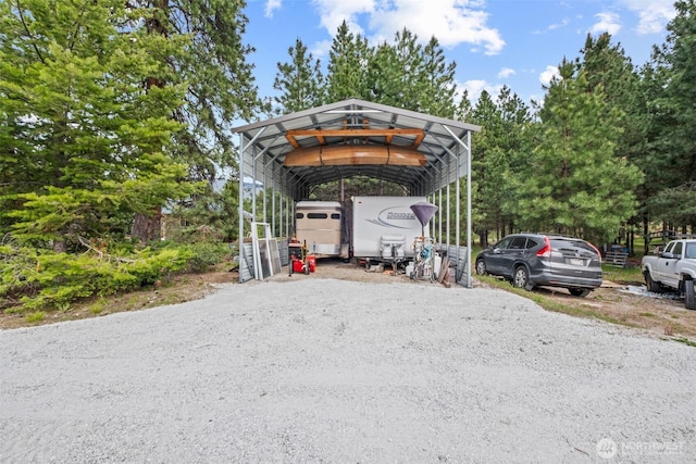12111 W Shugart Flats Rd, Leavenworth, WA 98826 - view of parking featuring a carport and driveway