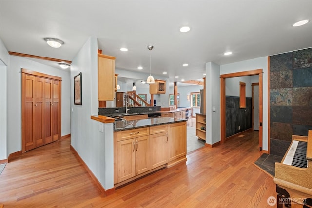 12111 W Shugart Flats Rd, Leavenworth, WA 98826 - kitchen with a peninsula, light brown cabinetry, light wood-style flooring, and recessed lighting