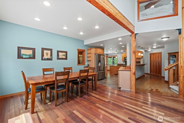 12111 W Shugart Flats Rd, Leavenworth, WA 98826 - dining room with wood finished floors, recessed lighting, stairway, and baseboards