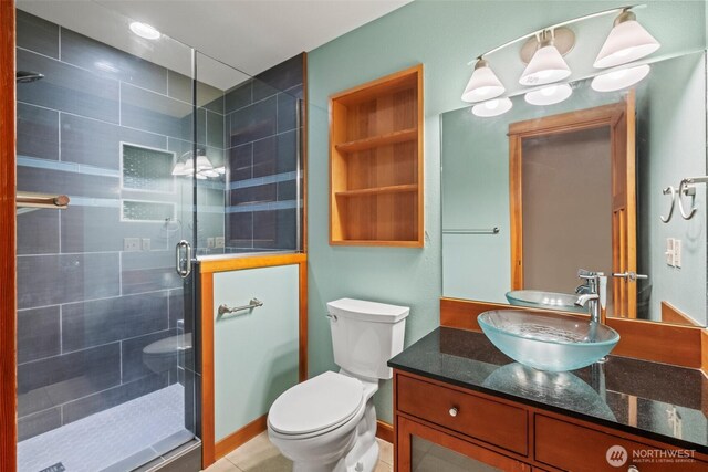 12111 W Shugart Flats Rd, Leavenworth, WA 98826 - full bathroom with a stall shower, vanity, and toilet