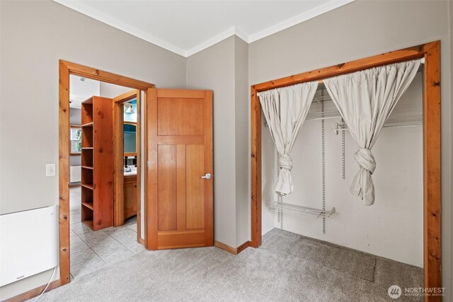 12111 W Shugart Flats Rd, Leavenworth, WA 98826 - unfurnished bedroom with crown molding and carpet flooring