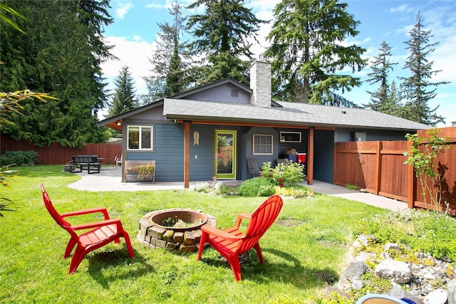 839 St Andrews Way, Bellingham, WA 98229 - back of house with an outdoor fire pit, a chimney, and a patio area