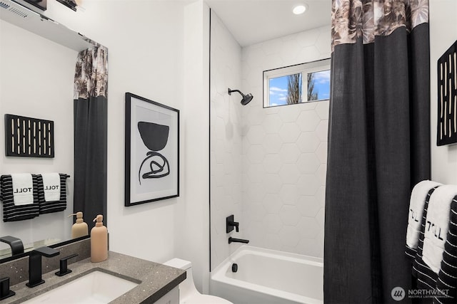 bathroom with toilet, shower / tub combo, vanity, and recessed lighting