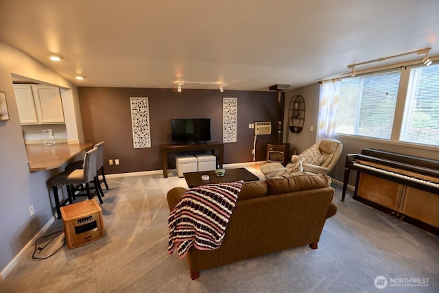 living room with carpet floors, baseboards, and recessed lighting