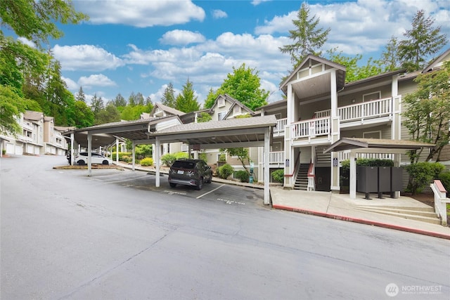 18505 SE Newport Way Unit A203, Issaquah, WA 98027 - covered parking lot featuring stairway
