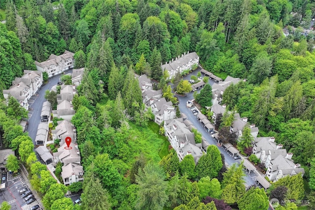 18505 SE Newport Way Unit A203, Issaquah, WA 98027 - aerial perspective of suburban area featuring a heavily wooded area