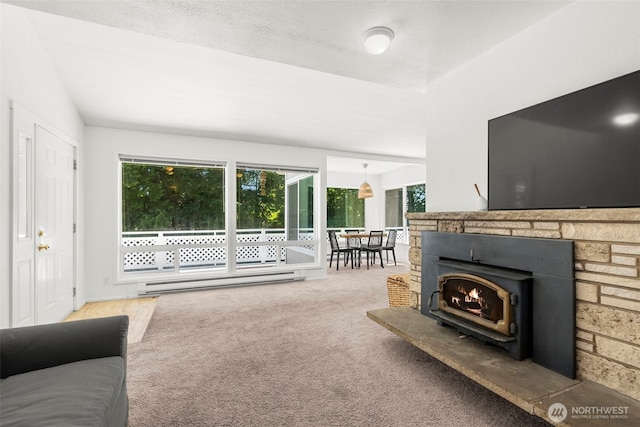 270 Puget Loop, Port Ludlow, WA 98365 - living room with baseboard heating, carpet flooring, and vaulted ceiling