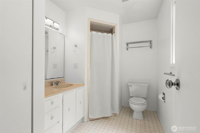 270 Puget Loop, Port Ludlow, WA 98365 - bathroom featuring vanity, tile patterned floors, and curtained shower