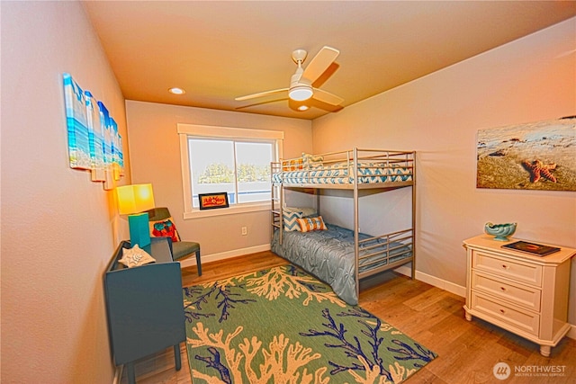 5341 S Bercot Rd, Freeland, WA 98249 - bedroom featuring wood finished floors, baseboards, and a ceiling fan