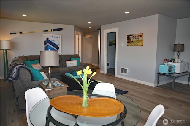 5341 S Bercot Rd, Freeland, WA 98249 - living area with wood finished floors, baseboards, and recessed lighting