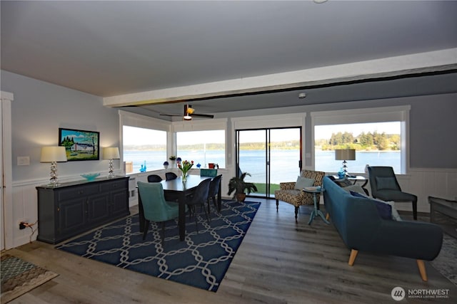 5341 S Bercot Rd, Freeland, WA 98249 - dining space featuring wainscoting, wood finished floors, and a water view