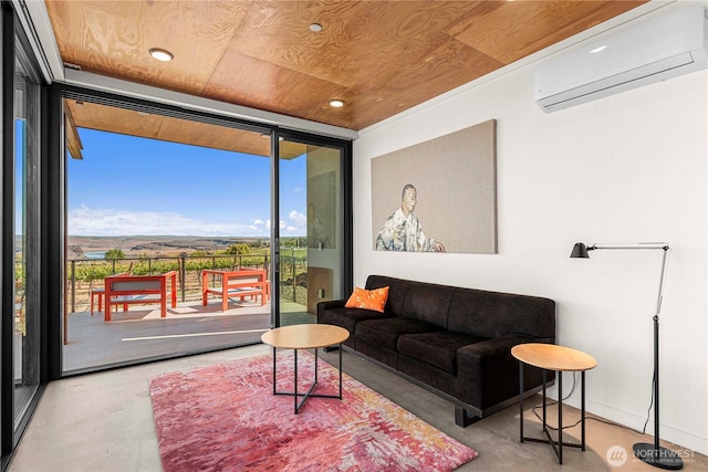 23692 NW Cliffe Pointe Rd Unit 6C, Quincy, WA 98848 - living area featuring a wall mounted AC, expansive windows, recessed lighting, and concrete floors