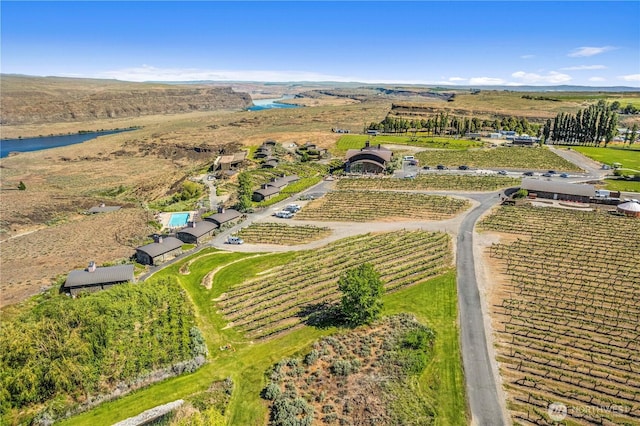 23692 NW Cliffe Pointe Rd Unit 6C, Quincy, WA 98848 - overview of rural landscape with rows of crops and a nearby body of water