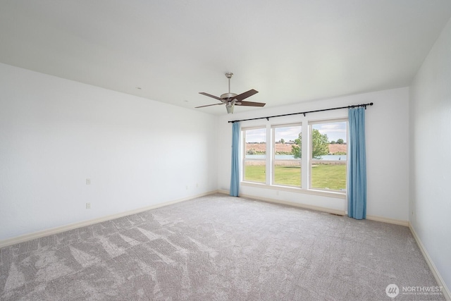 8306ROAD 3.2 NE, Moses Lake, WA 98837 - unfurnished room with carpet flooring, baseboards, and a ceiling fan