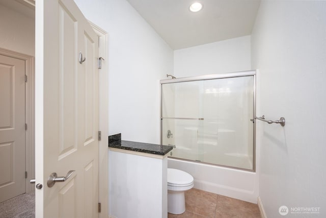 8306ROAD 3.2 NE, Moses Lake, WA 98837 - full bath with toilet, bath / shower combo with glass door, recessed lighting, tile patterned flooring, and baseboards