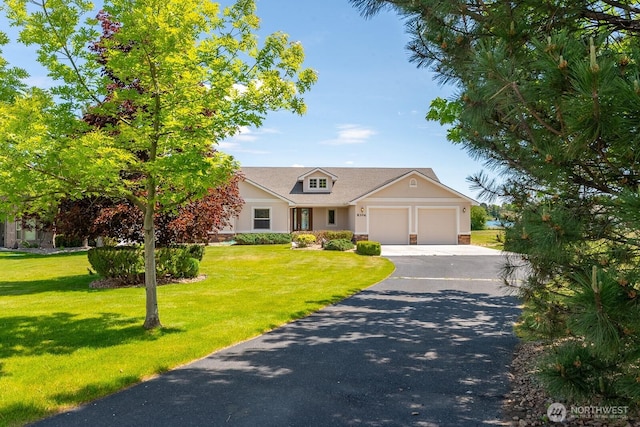 8306ROAD 3.2 NE, Moses Lake, WA 98837 - view of front facade featuring an attached garage, driveway, and a front lawn