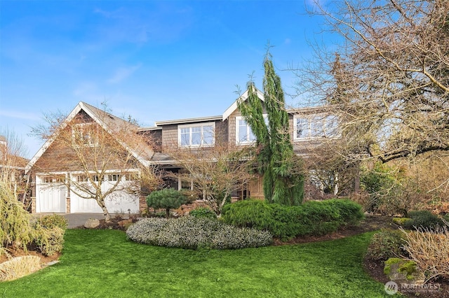 view of front of home with a front yard