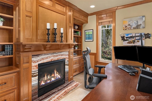 home office featuring built in features, a fireplace, recessed lighting, and light colored carpet