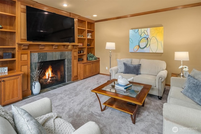 living area featuring ornamental molding, carpet, a fireplace, baseboards, and recessed lighting