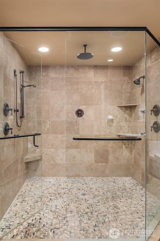 full bathroom featuring a stall shower and recessed lighting