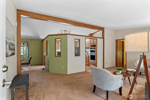 2610 E Section St Unit 115, Mount Vernon, WA 98274 - living area featuring light colored carpet and beamed ceiling