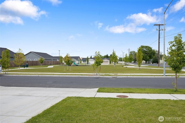 1003 NE Aspen Rd, Moses Lake, WA 98837 - view of road featuring sidewalks and a residential view