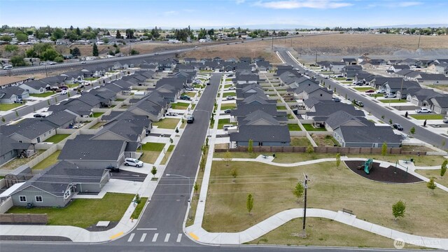 1003 NE Aspen Rd, Moses Lake, WA 98837 - aerial overview of property's location with nearby suburban area