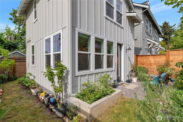 1415 29th Ave Unit C, Seattle, WA 98122 - view of side of property featuring board and batten siding
