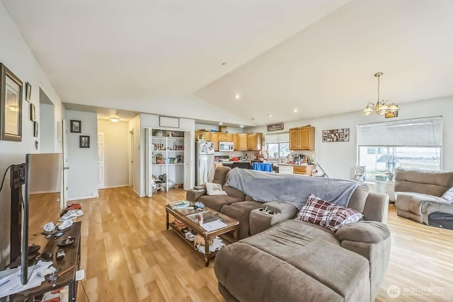 1488 Ocean Shores Blvd SW, Ocean Shores, WA 98569 - living room featuring a chandelier, light wood-type flooring, and recessed lighting