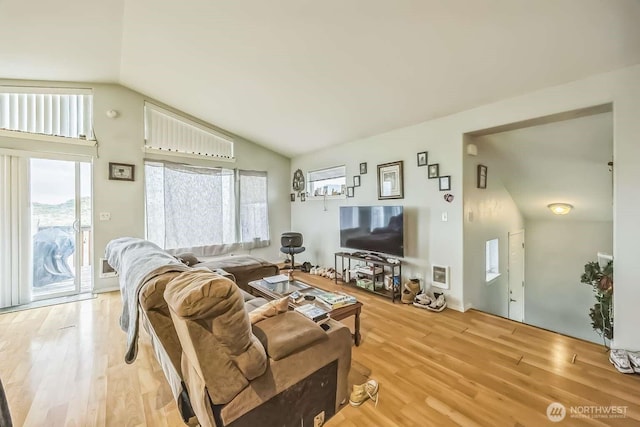 1488 Ocean Shores Blvd SW, Ocean Shores, WA 98569 - living area with lofted ceiling and light wood-type flooring