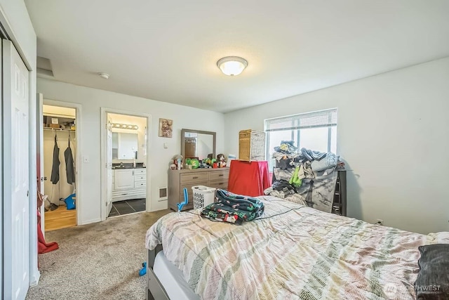 1488 Ocean Shores Blvd SW, Ocean Shores, WA 98569 - bedroom with a closet, carpet flooring, and ensuite bathroom