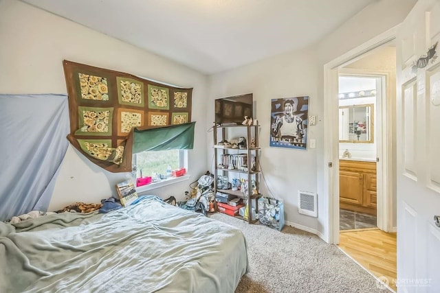 1488 Ocean Shores Blvd SW, Ocean Shores, WA 98569 - bedroom featuring connected bathroom and carpet flooring