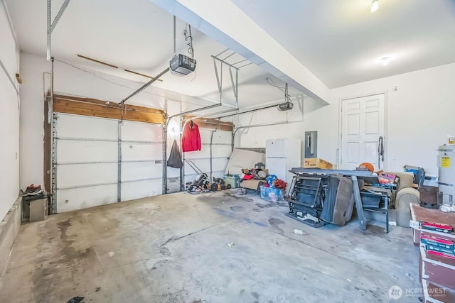 1488 Ocean Shores Blvd SW, Ocean Shores, WA 98569 - garage with freestanding refrigerator, a garage door opener, and electric panel