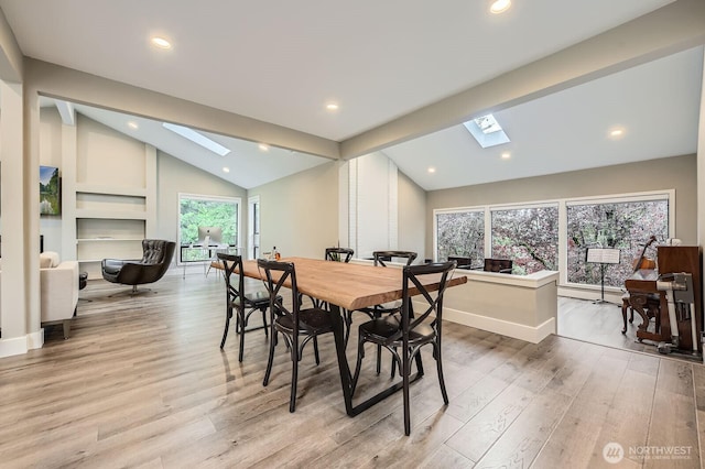 14323 SE 49th St, Bellevue, WA 98006 - dining space with a skylight, light wood-type flooring, recessed lighting, and baseboards