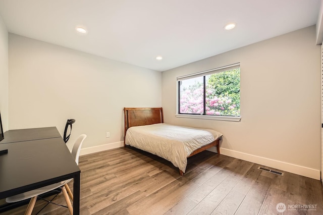 14323 SE 49th St, Bellevue, WA 98006 - bedroom with baseboards, wood finished floors, and recessed lighting