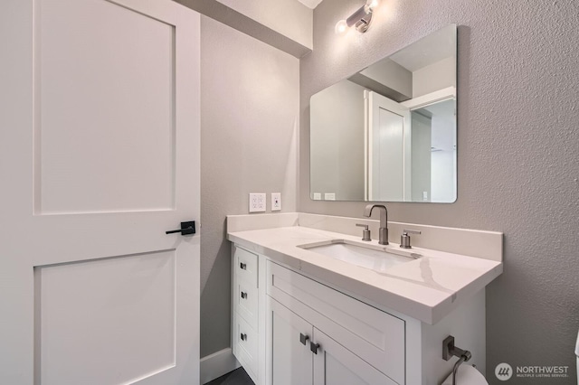 14323 SE 49th St, Bellevue, WA 98006 - bathroom with vanity and a textured wall