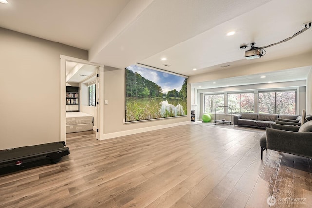 14323 SE 49th St, Bellevue, WA 98006 - living area featuring wood finished floors, recessed lighting, and baseboards