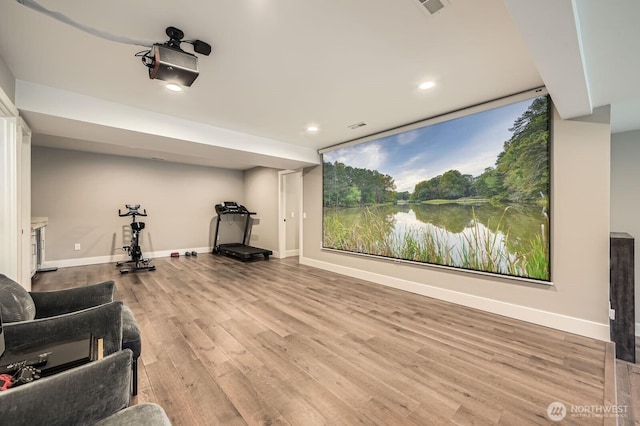 14323 SE 49th St, Bellevue, WA 98006 - cinema room featuring wood finished floors, baseboards, and recessed lighting