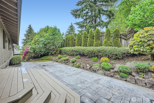 14323 SE 49th St, Bellevue, WA 98006 - wooden deck featuring a patio area