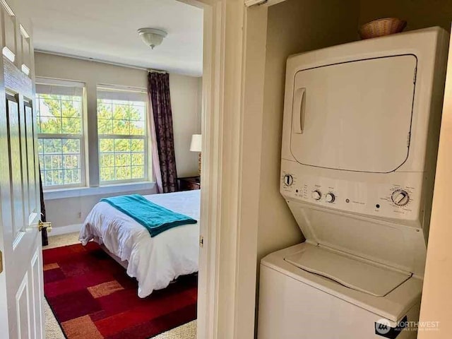 1600 W Ocean Ave Unit 1236, Westport, WA 98595 - bedroom featuring estacked washer and dryer and carpet