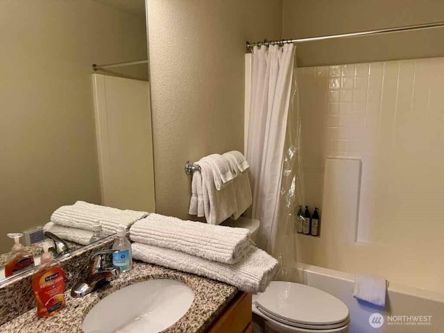 1600 W Ocean Ave Unit 1236, Westport, WA 98595 - bathroom with vanity, shower / bath combination with curtain, and toilet